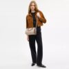 Sac satchel Rowan en Signature Canvas à motifs géométriques