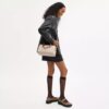 Sac satchel Rowan en Signature Canvas à motifs géométriques