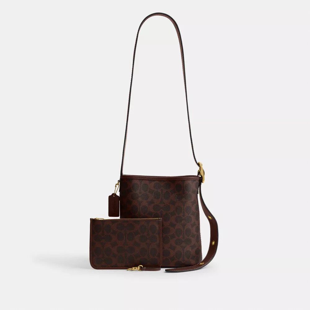 Sac seau Bleecker 21 en Signature Canvas