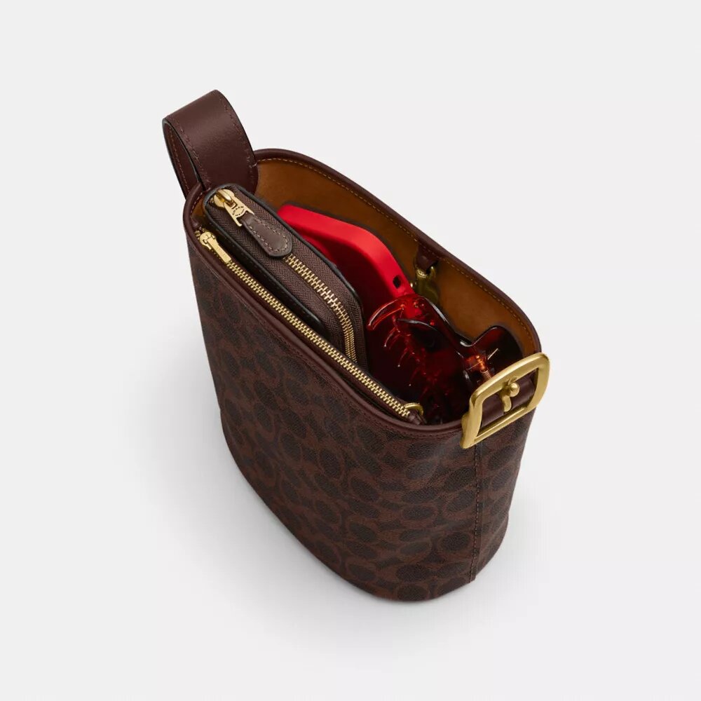 Sac seau Bleecker 21 en Signature Canvas