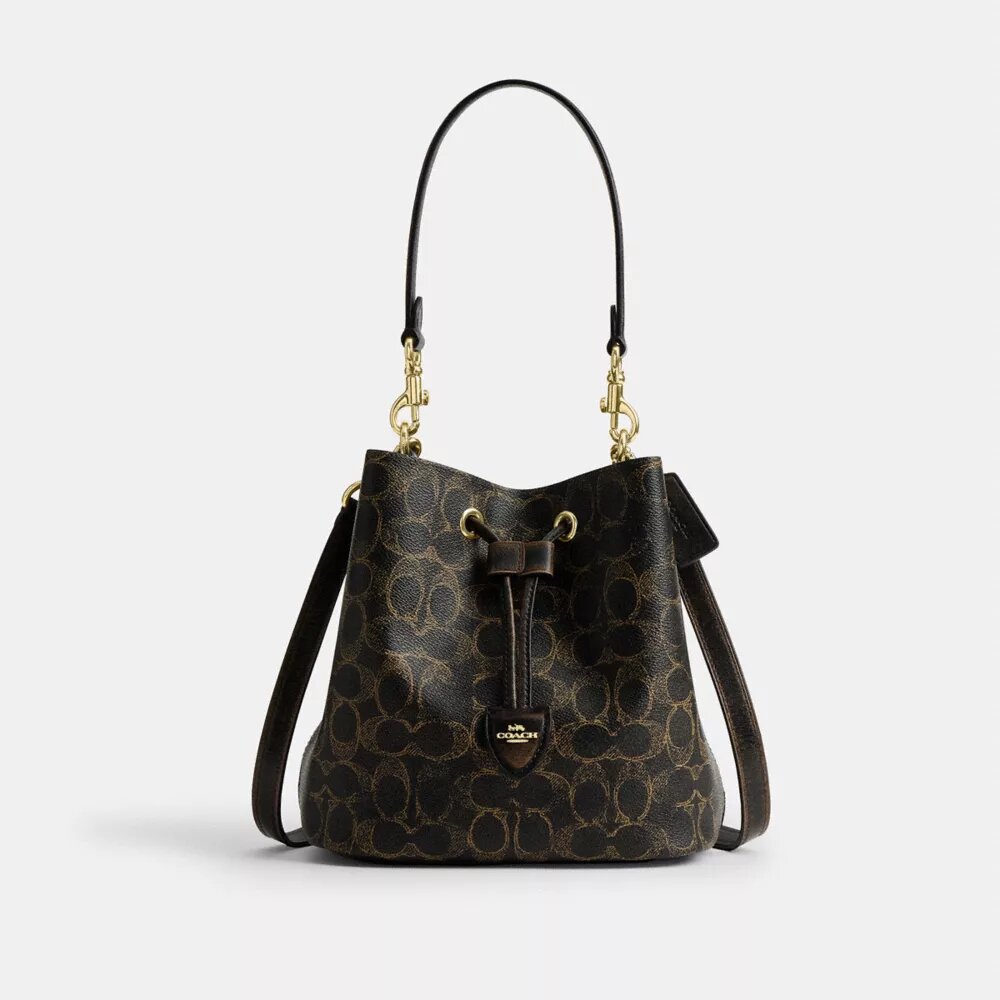 Sac seau Rowan en Signature Canvas avec Charms