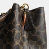 Sac seau Rowan en Signature Canvas avec Charms