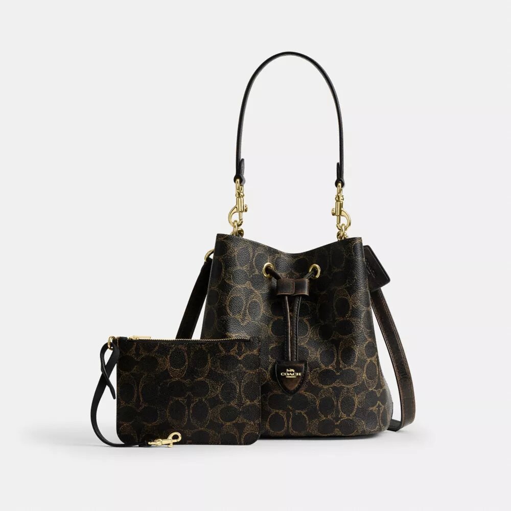 Sac seau Rowan en Signature Canvas avec Charms