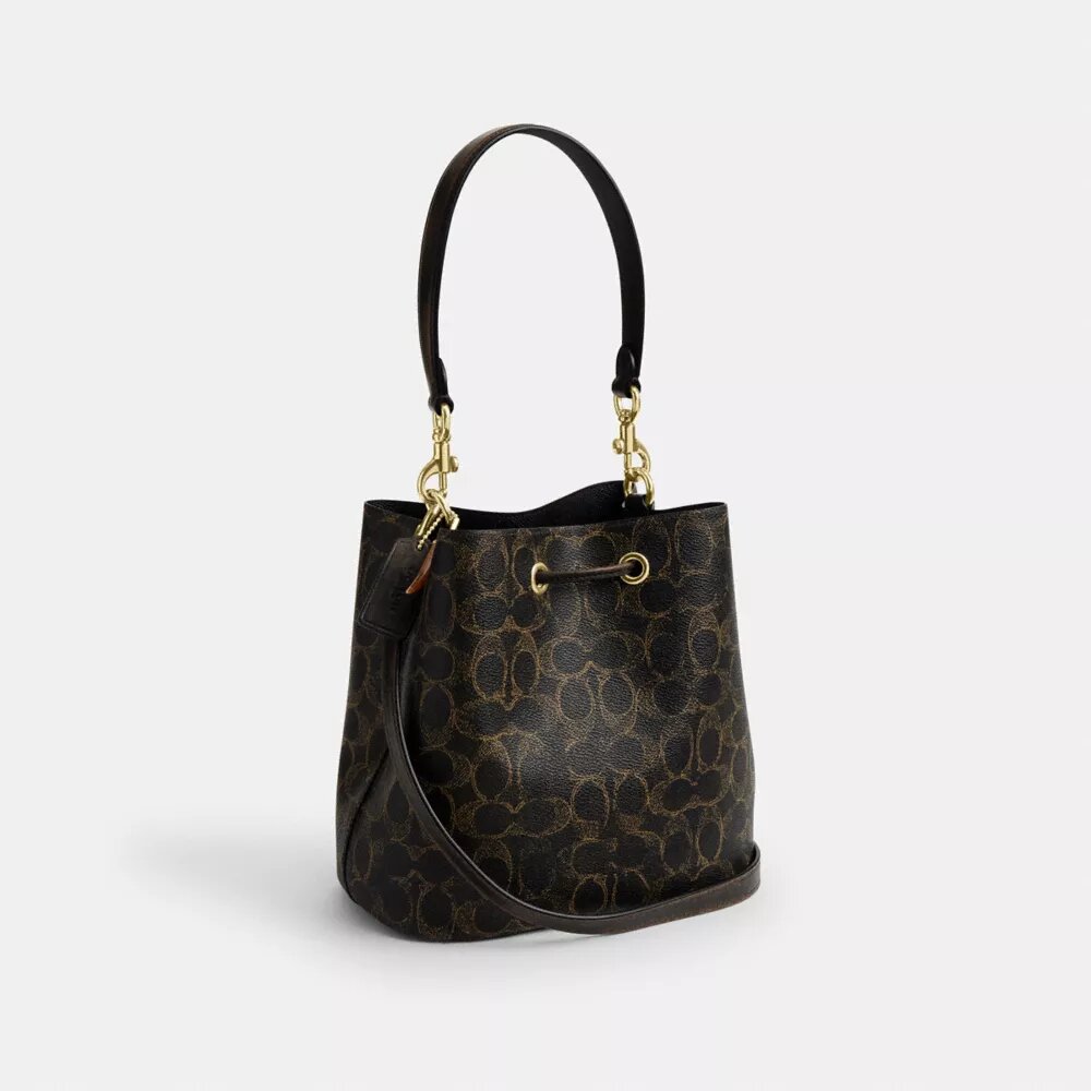 Sac seau Rowan en Signature Canvas avec Charms