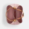 Sac seau Rowan en Signature Canvas avec Charms