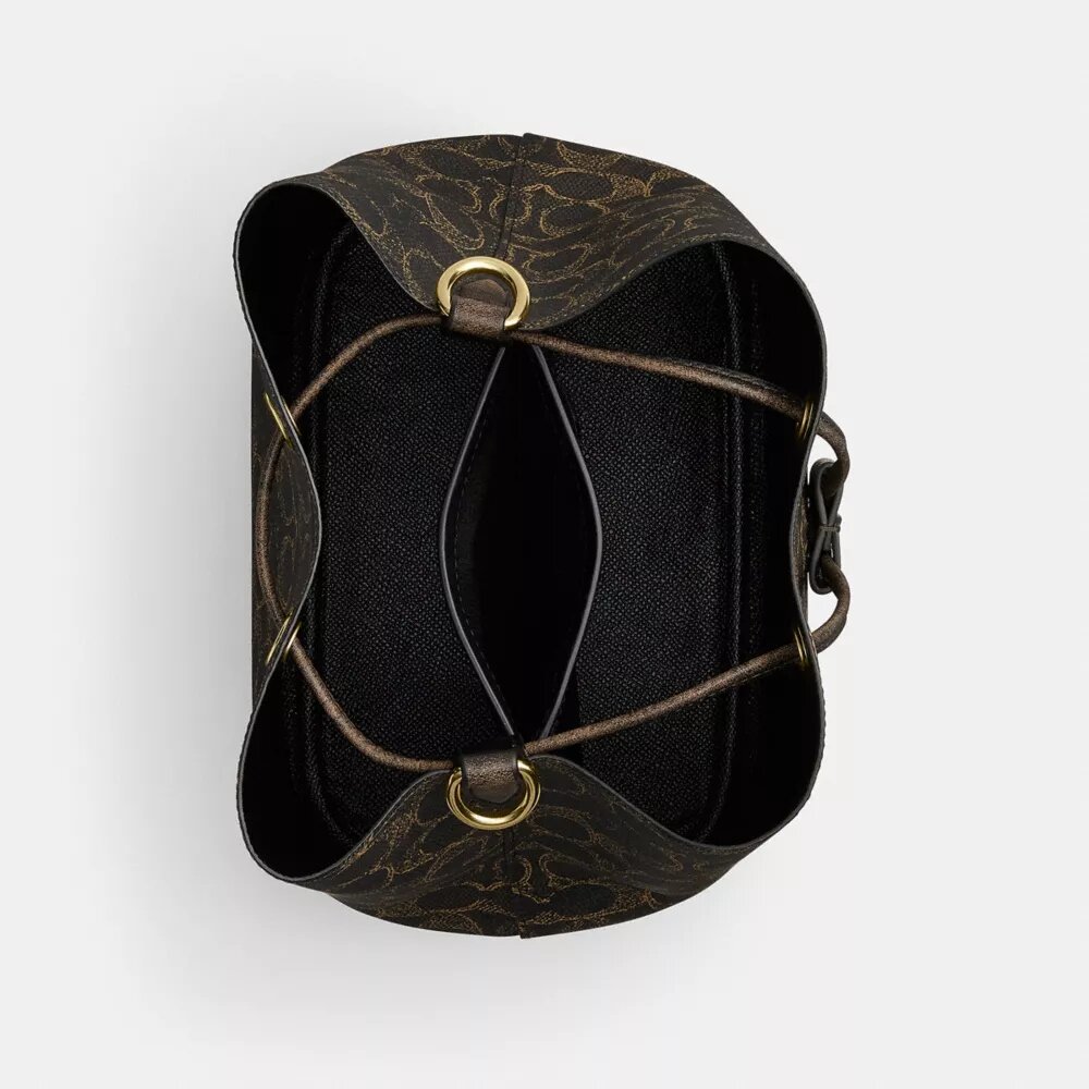 Sac seau Rowan en Signature Canvas avec Charms