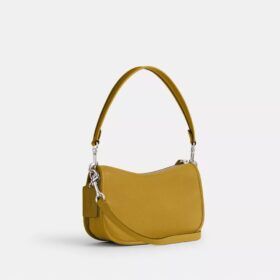 Sac Swinger Disney x Coach en cuir régénéré avec Mickey Mouse et ses amis
