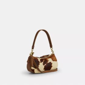 Sacs porté épaule Ashton en cuir de veau imprimé « Cow Print »