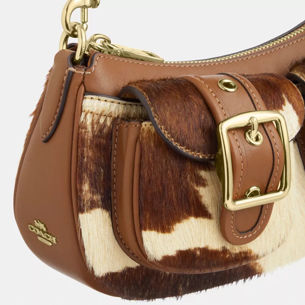 Sacs porté épaule Ashton en cuir de veau imprimé « Cow Print »