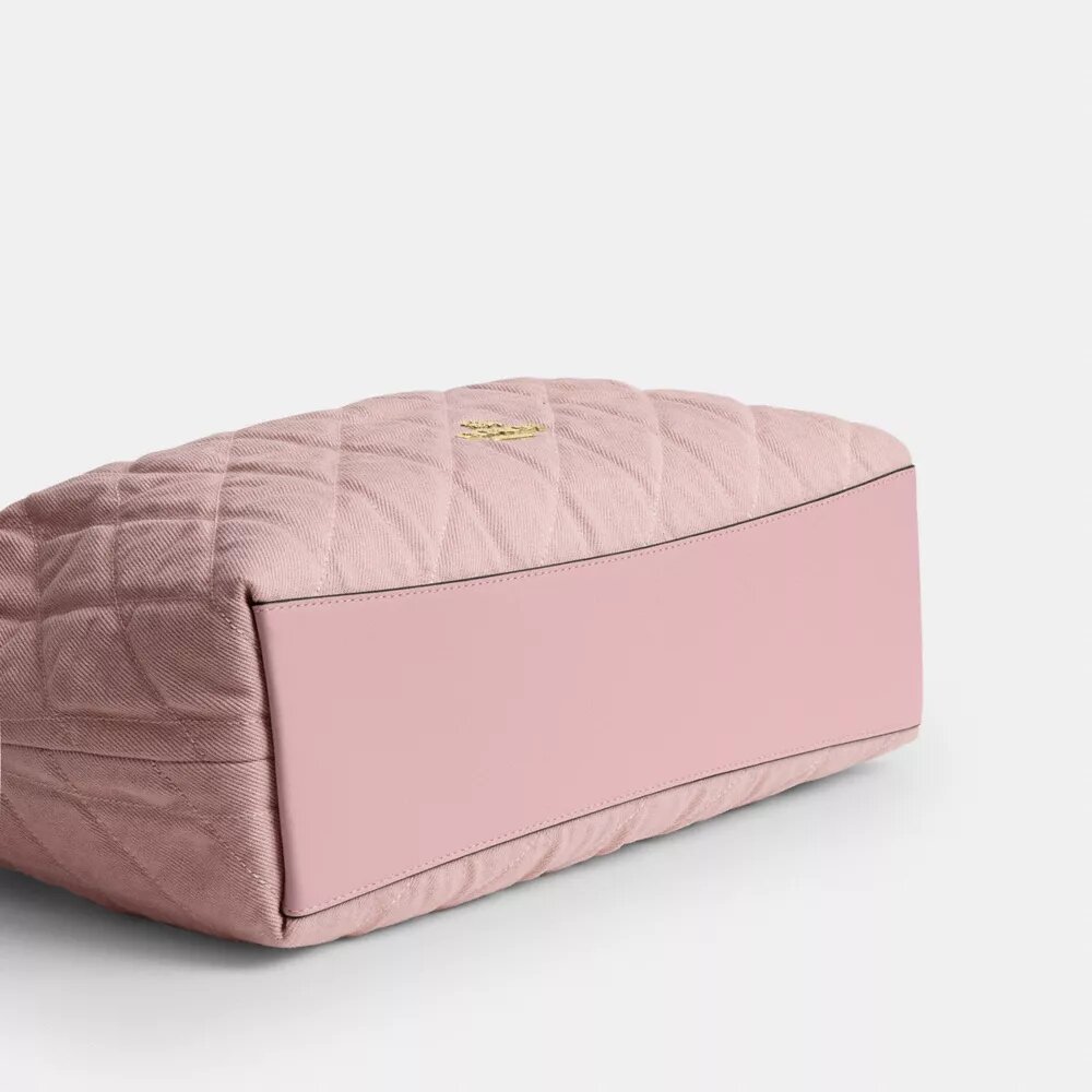 Sacs porté épaule Evelyn en denim « Loved » avec matelassage et breloque