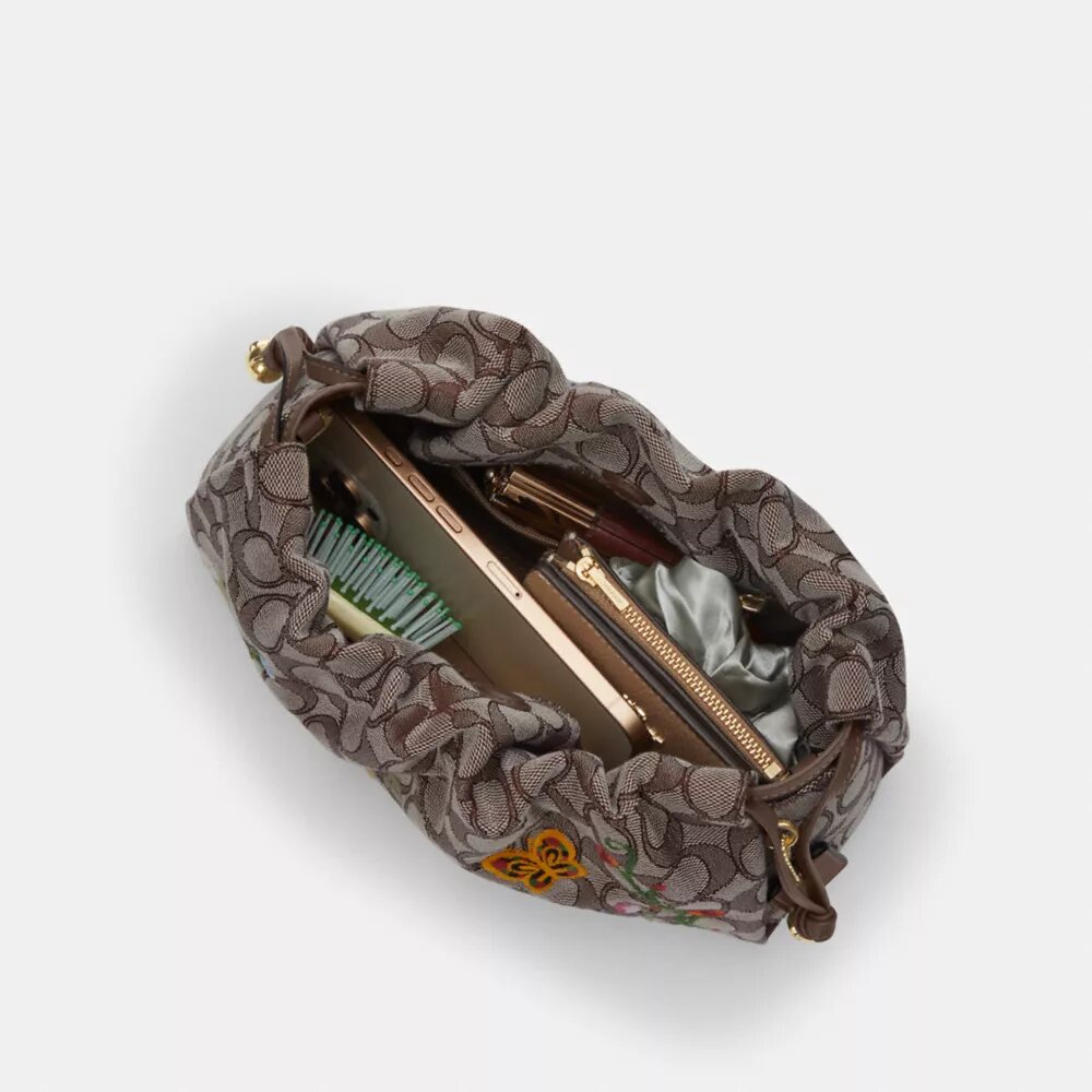 Sacs porté épaule Faye en jacquard emblématique avec broderie florale