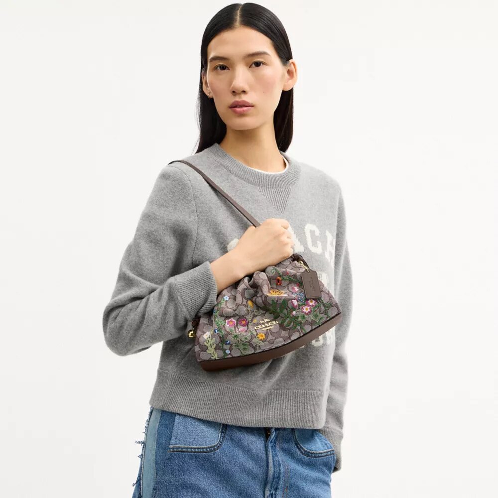 Sacs porté épaule Faye en jacquard emblématique avec broderie florale