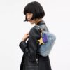 Sacs porté épaule Teri en denim « Loved » avec Charms