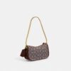 Sacs Swinger 20 avec chaîne en jacquard emblématique