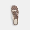 Sandales à talon bas avec bride en forme de nœud en jacquard emblématique