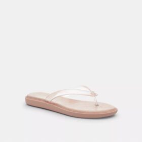 Tongs en plastique transparent dans notre motif emblématique