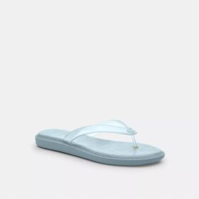 Tongs en plastique transparent dans notre motif emblématique