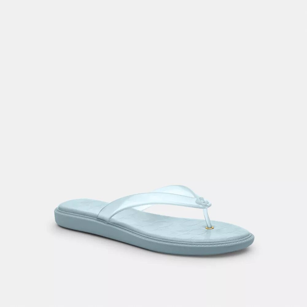 Tongs en plastique transparent dans notre motif emblématique