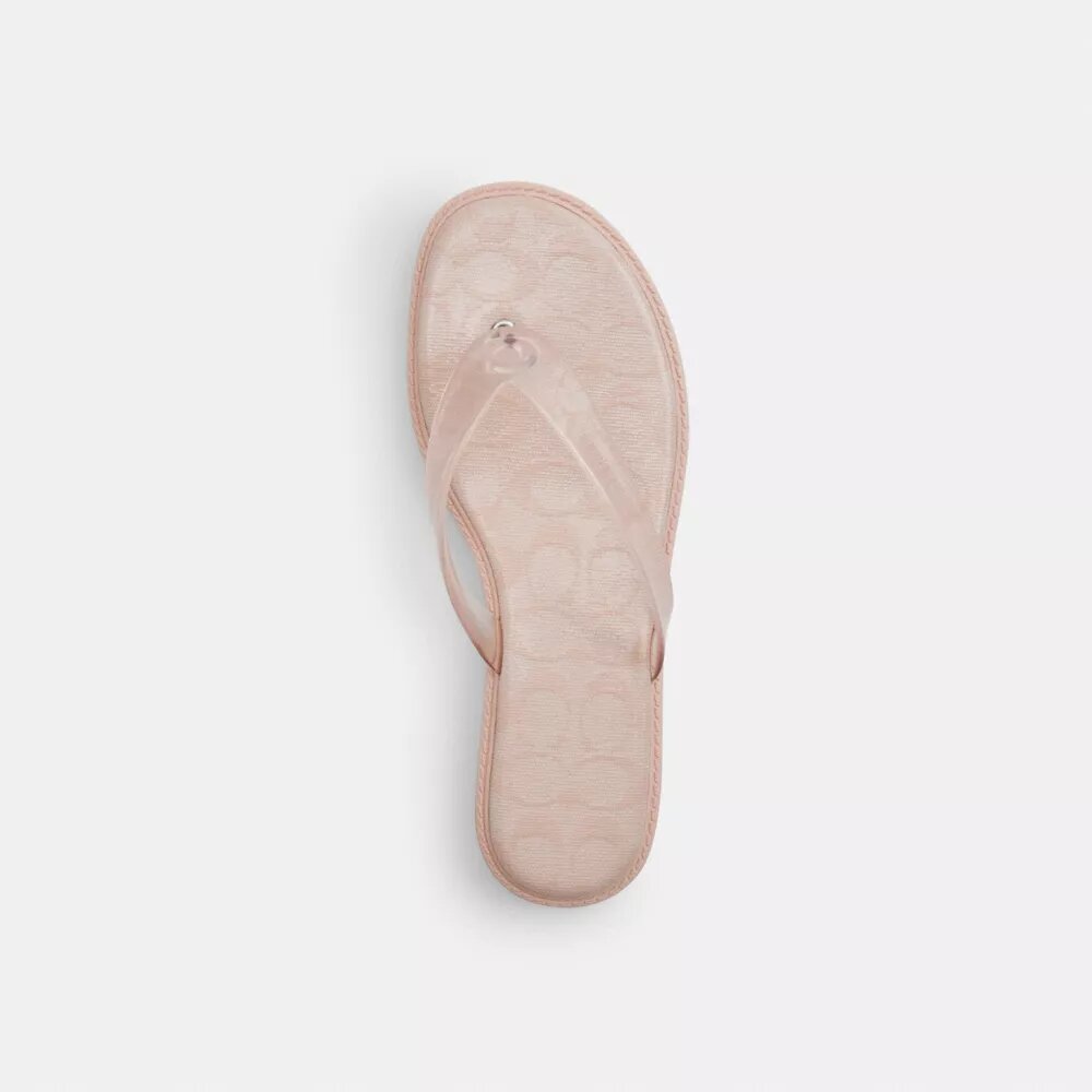 Tongs en plastique transparent dans notre motif emblématique