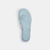 Tongs en plastique transparent dans notre motif emblématique