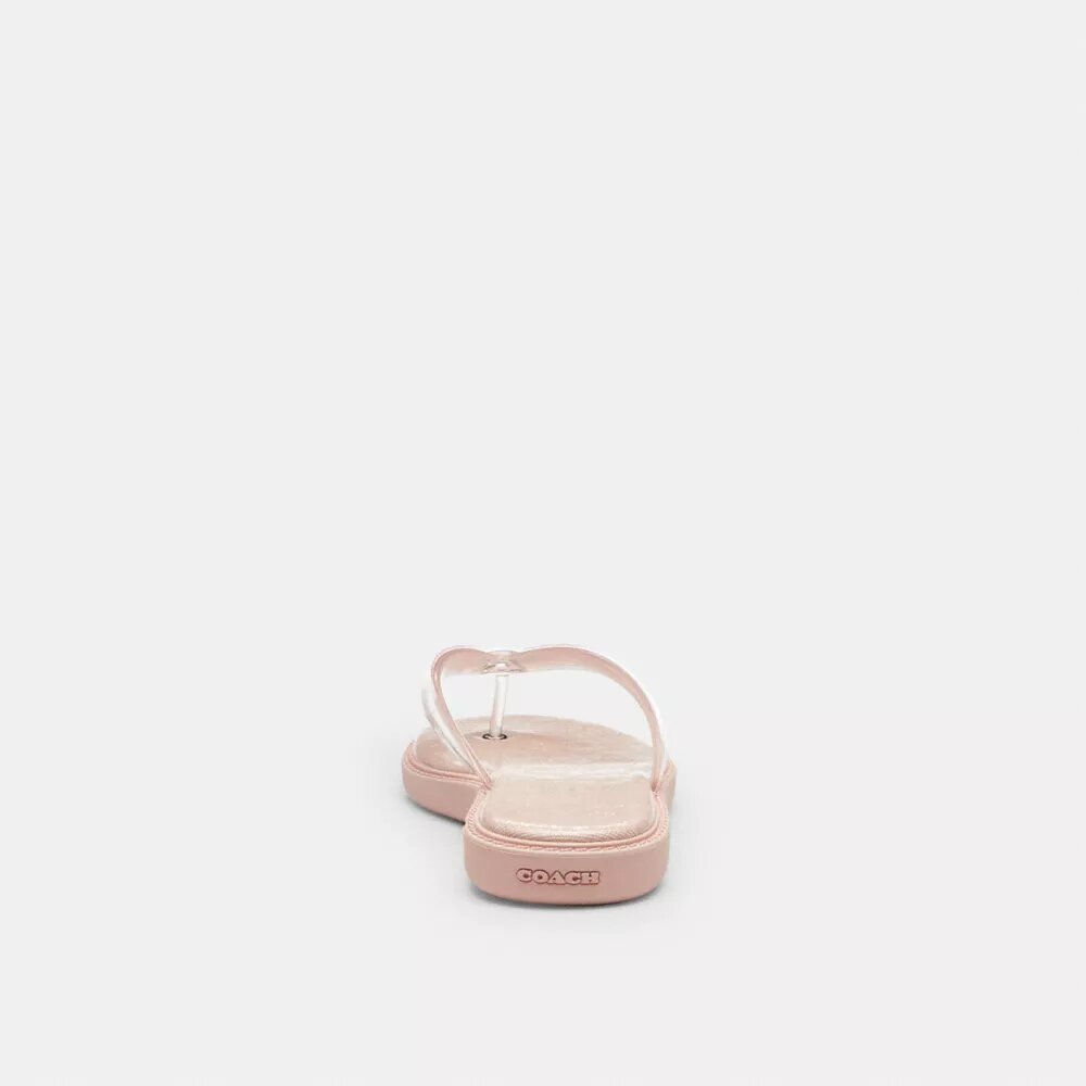 Tongs en plastique transparent dans notre motif emblématique