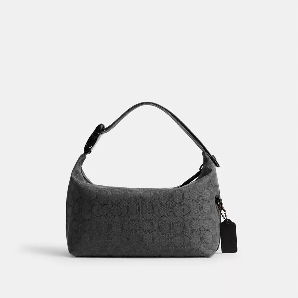 Trousse de voyage avec Speedclip en jacquard signature