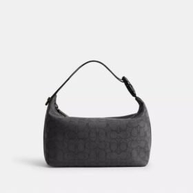 Trousse de voyage avec Speedclip en jacquard signature