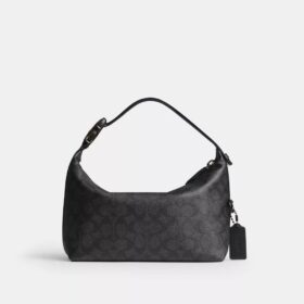 Trousse de voyage avec Speedclip en Signature Canvas