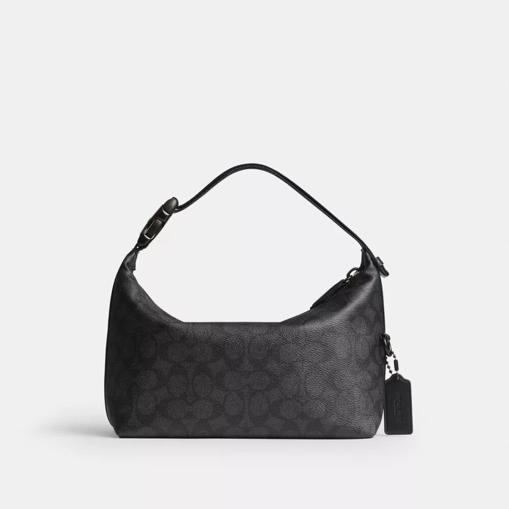 Trousse de voyage avec Speedclip en Signature Canvas