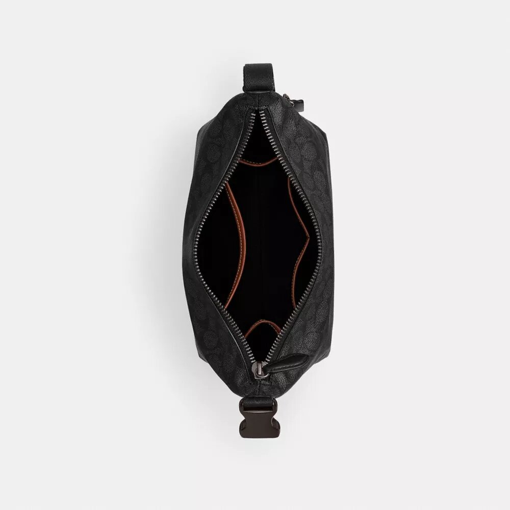 Trousse de voyage avec Speedclip en Signature Canvas