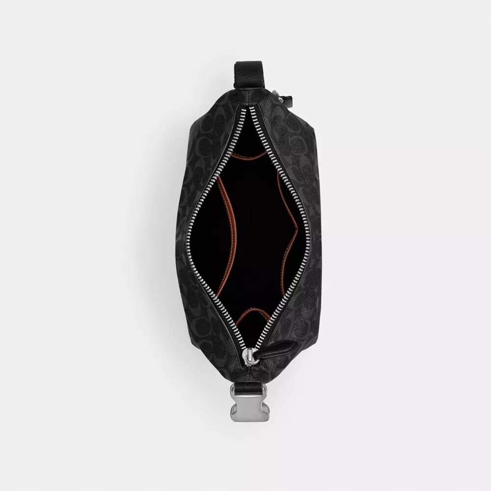 Trousse de voyage avec Speedclip en Signature Canvas