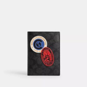 Étui pour passeport en Signature Canvas avec écussons