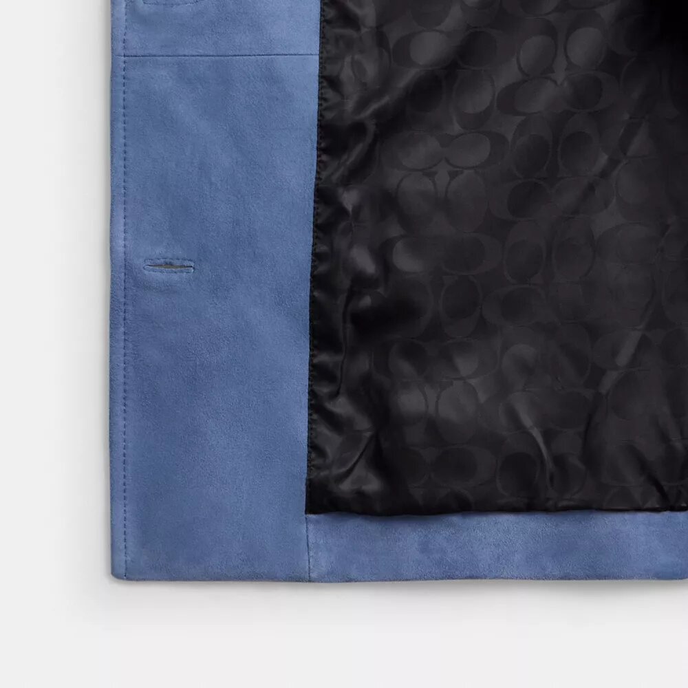 Veste en daim cloutée