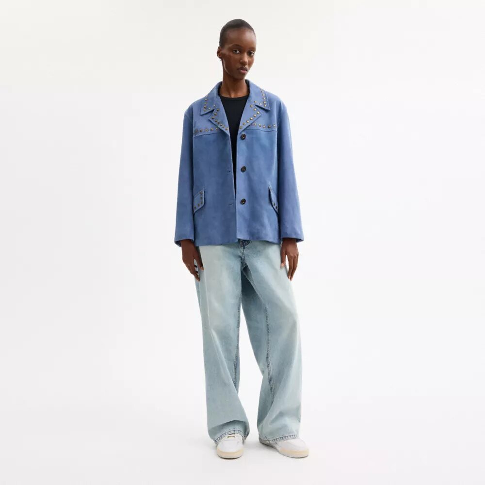 Veste en daim cloutée