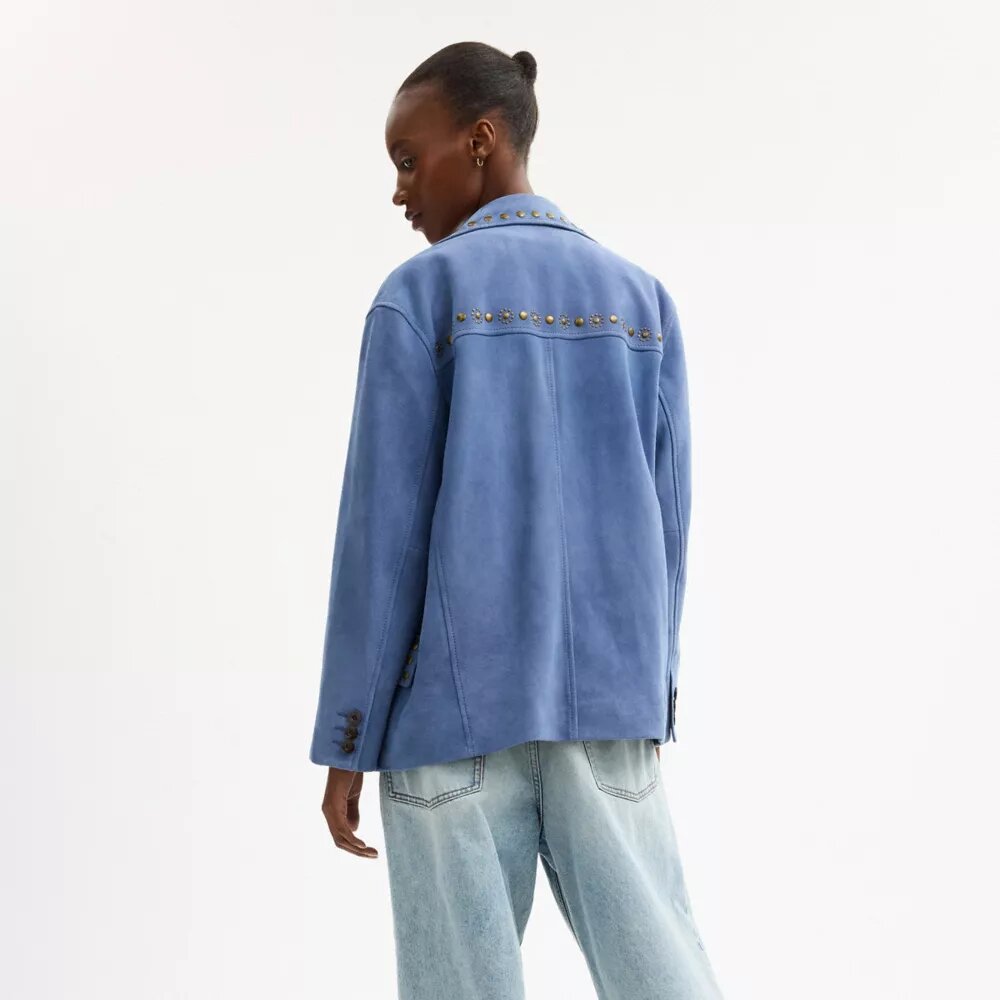 Veste en daim cloutée