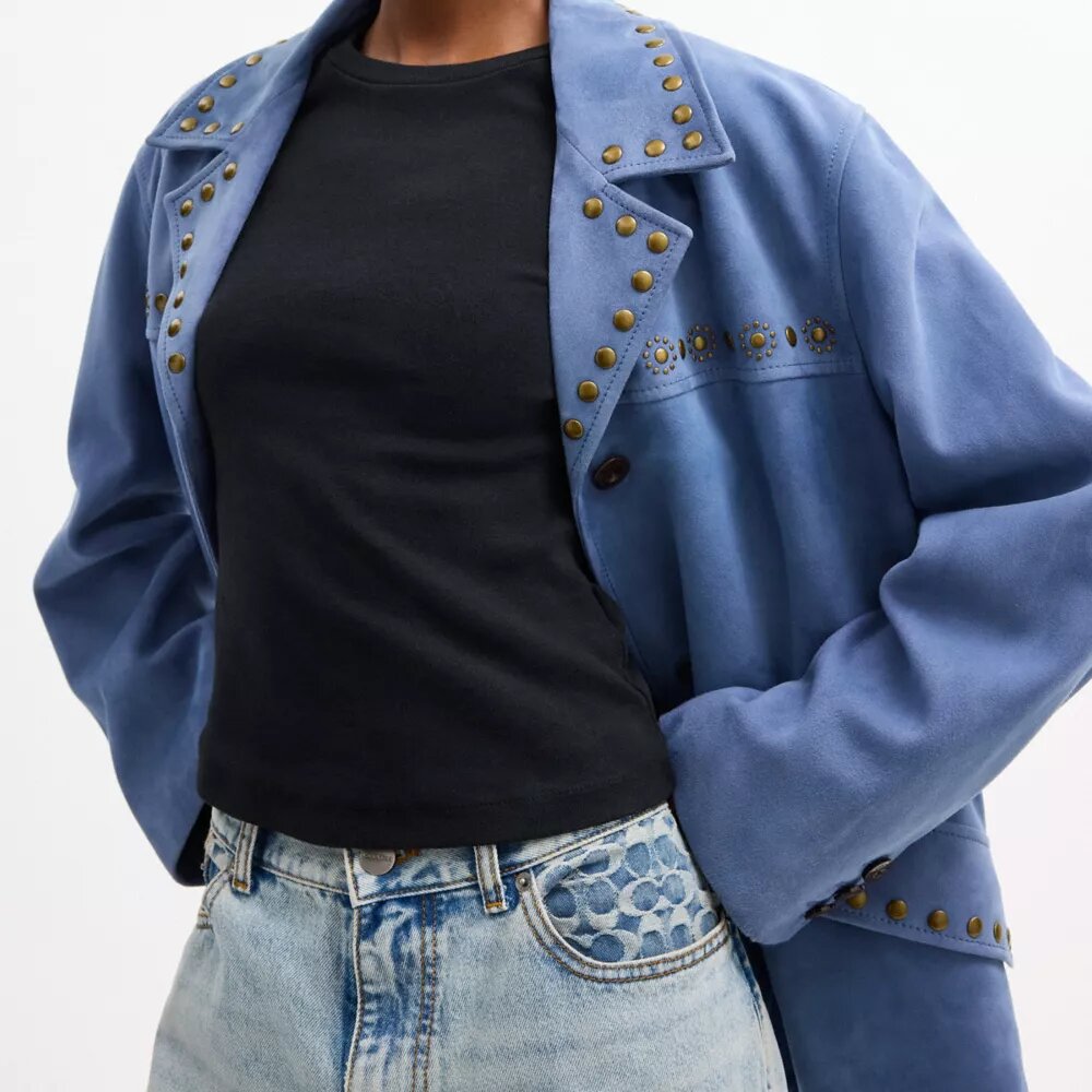 Veste en daim cloutée