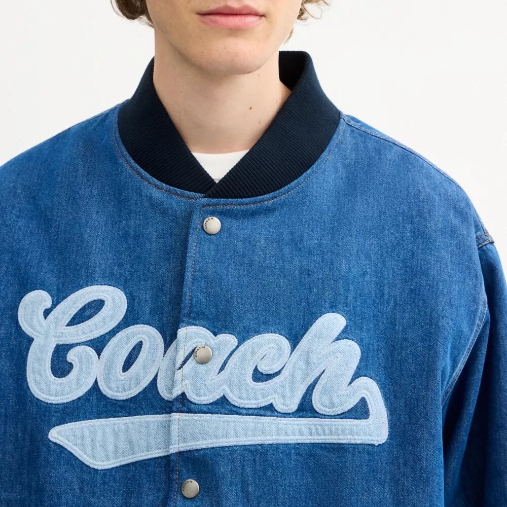 Veste universitaire en denim de coton biologique